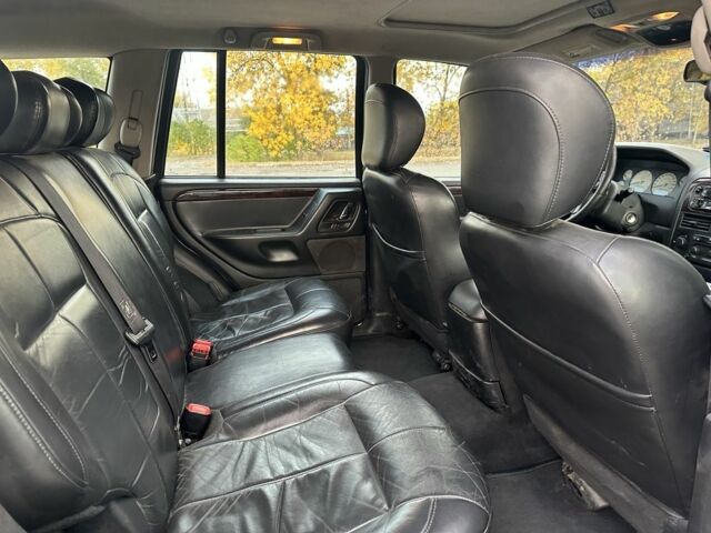 Зеленый Джип Гранд Чероки, объемом двигателя 2.7 л и пробегом 378 тыс. км за 5800 $, фото 4 на Automoto.ua