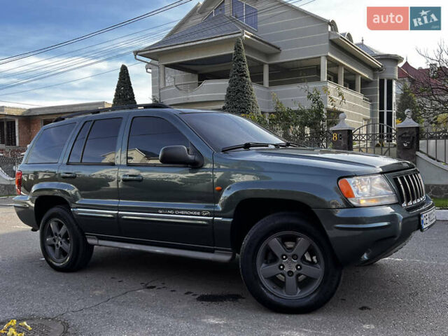 Зелений Джип Grand Cherokee, об'ємом двигуна 2.7 л та пробігом 376 тис. км за 9800 $, фото 13 на Automoto.ua