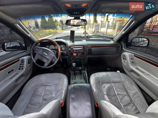 Зелений Джип Grand Cherokee, об'ємом двигуна 2.7 л та пробігом 376 тис. км за 9800 $, фото 17 на Automoto.ua