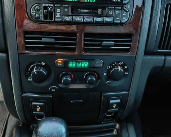 Зелений Джип Grand Cherokee, об'ємом двигуна 2.7 л та пробігом 374 тис. км за 9300 $, фото 15 на Automoto.ua