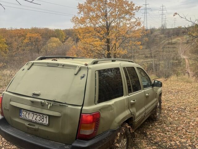 Джип Гранд Чероки 2003 в Харькове на Automoto.ua Зеленый Джип Гранд Чероки, объемом двигателя 2.7 л и пробегом 250 тыс. км за 3500 $, фото 7 на Automoto.ua