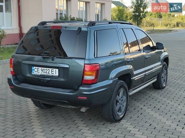 Зелений Джип Grand Cherokee, об'ємом двигуна 2.7 л та пробігом 374 тис. км за 9300 $, фото 6 на Automoto.ua