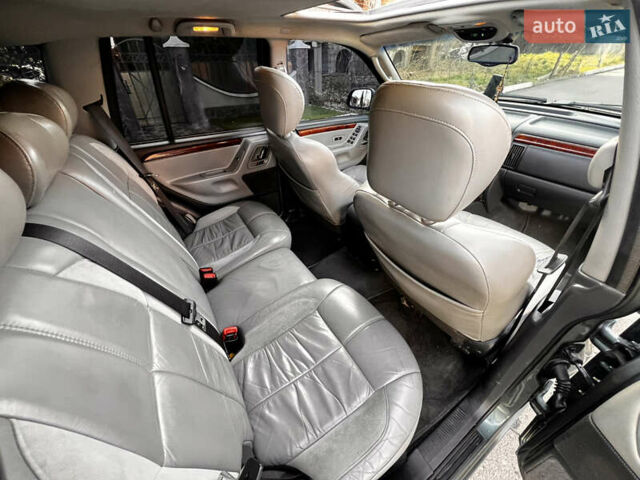 Зелений Джип Grand Cherokee, об'ємом двигуна 2.7 л та пробігом 376 тис. км за 9800 $, фото 24 на Automoto.ua