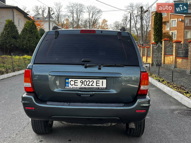 Зелений Джип Grand Cherokee, об'ємом двигуна 2.7 л та пробігом 376 тис. км за 9800 $, фото 10 на Automoto.ua