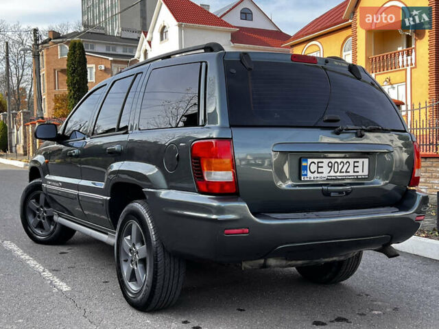 Зелений Джип Grand Cherokee, об'ємом двигуна 2.7 л та пробігом 376 тис. км за 9800 $, фото 11 на Automoto.ua