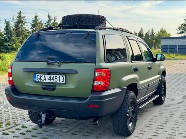 Зеленый Джип Гранд Чероки, объемом двигателя 2.7 л и пробегом 297 тыс. км за 2850 $, фото 4 на Automoto.ua