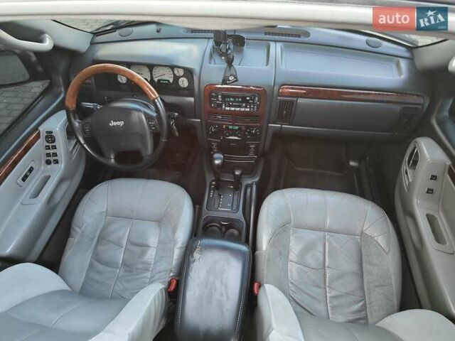 Зелений Джип Grand Cherokee, об'ємом двигуна 2.7 л та пробігом 374 тис. км за 9300 $, фото 24 на Automoto.ua