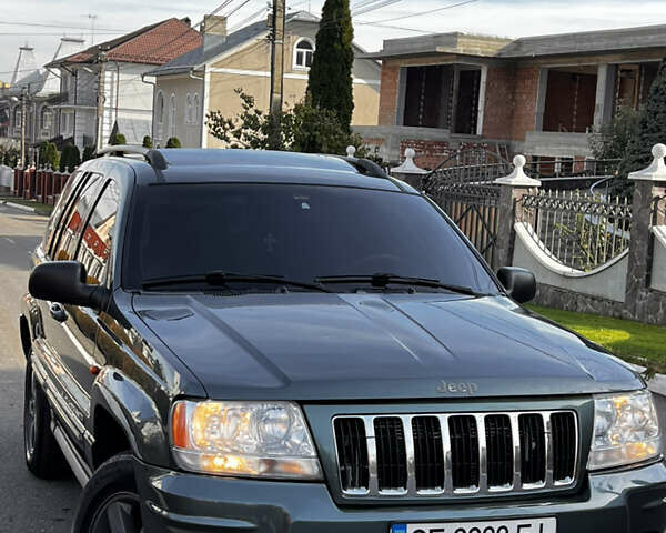 Зелений Джип Grand Cherokee, об'ємом двигуна 2.7 л та пробігом 376 тис. км за 9800 $, фото 7 на Automoto.ua