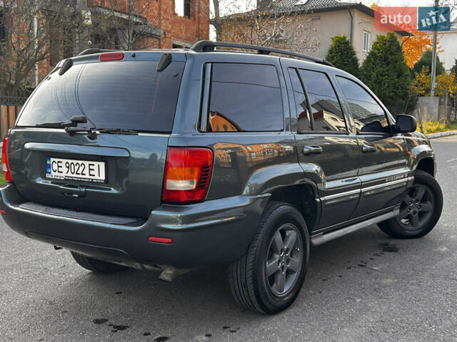 Зелений Джип Grand Cherokee, об'ємом двигуна 2.7 л та пробігом 376 тис. км за 9800 $, фото 9 на Automoto.ua
