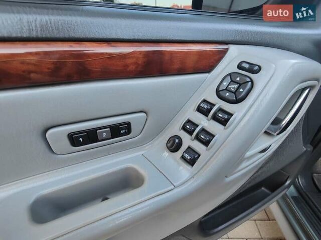 Зелений Джип Grand Cherokee, об'ємом двигуна 2.7 л та пробігом 374 тис. км за 9300 $, фото 21 на Automoto.ua