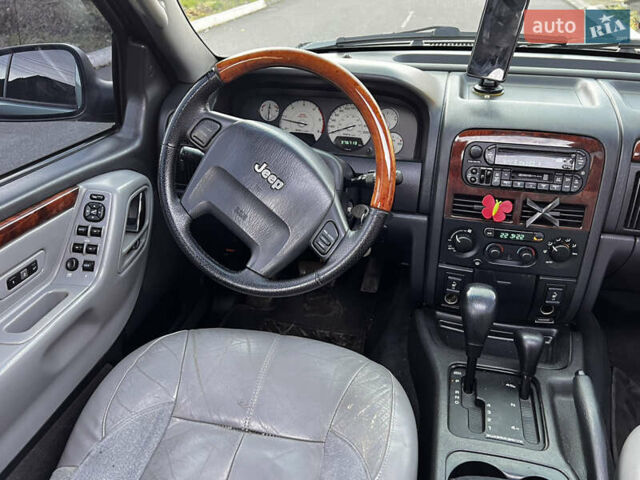 Зелений Джип Grand Cherokee, об'ємом двигуна 2.7 л та пробігом 376 тис. км за 9800 $, фото 18 на Automoto.ua