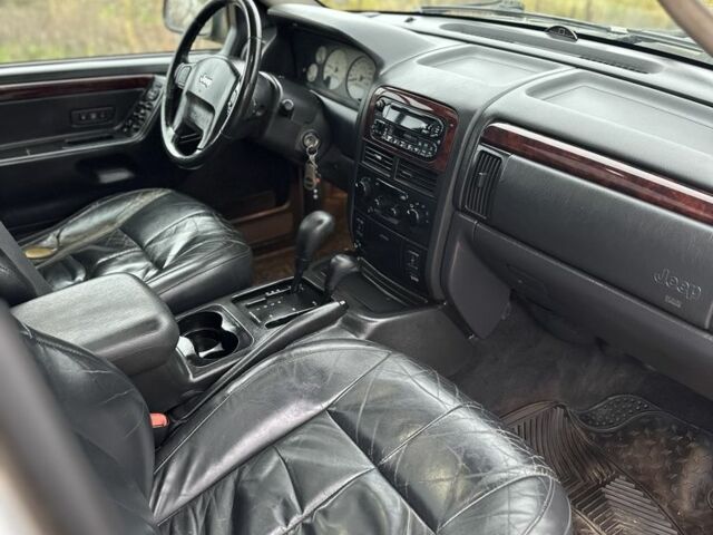 Зеленый Джип Гранд Чероки, объемом двигателя 2.7 л и пробегом 222 тыс. км за 3800 $, фото 10 на Automoto.ua