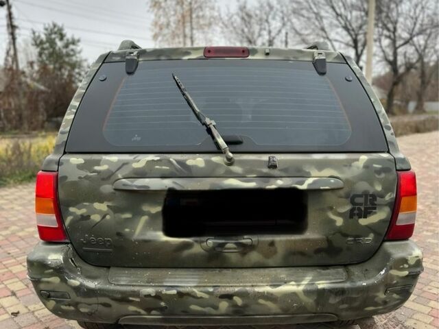 Зеленый Джип Гранд Чероки, объемом двигателя 2.7 л и пробегом 222 тыс. км за 3800 $, фото 4 на Automoto.ua