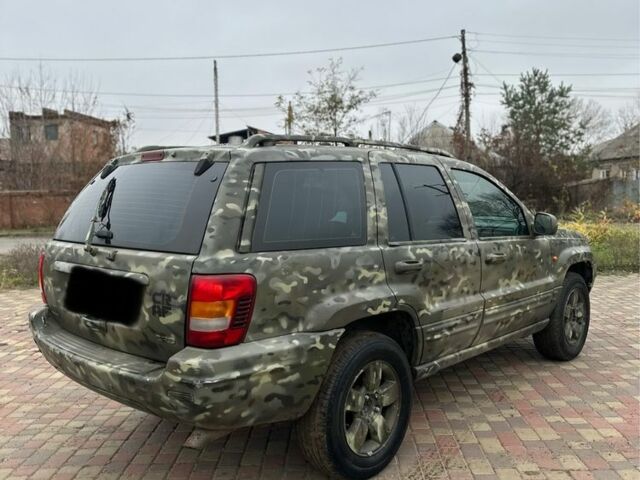 Зеленый Джип Гранд Чероки, объемом двигателя 2.7 л и пробегом 222 тыс. км за 3800 $, фото 3 на Automoto.ua