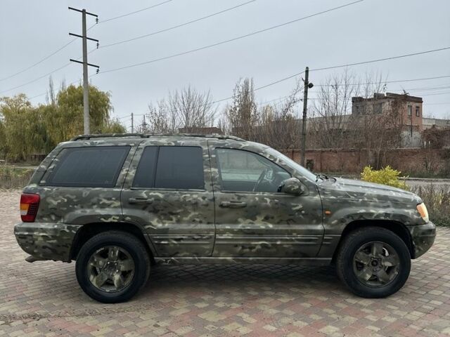 Зеленый Джип Гранд Чероки, объемом двигателя 2.7 л и пробегом 222 тыс. км за 3800 $, фото 2 на Automoto.ua