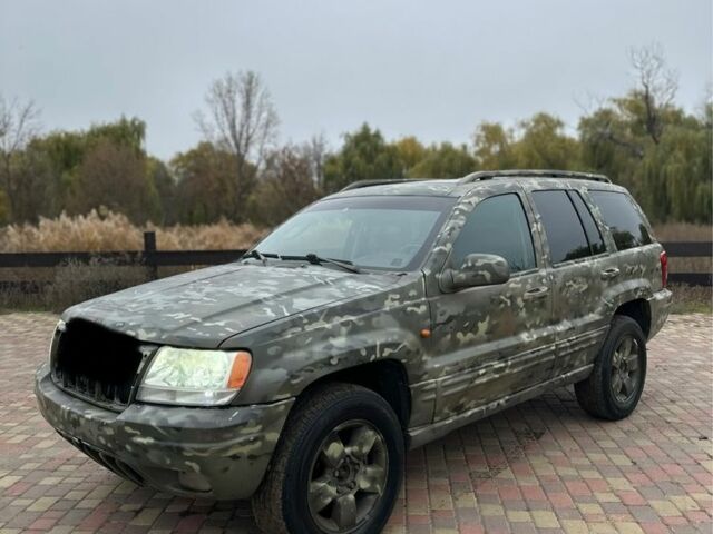 Зеленый Джип Гранд Чероки, объемом двигателя 2.7 л и пробегом 222 тыс. км за 3800 $, фото 7 на Automoto.ua