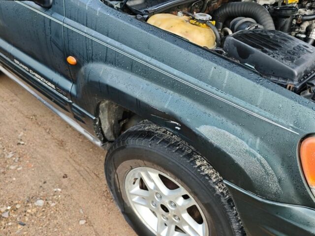 Зелений Джип Grand Cherokee, об'ємом двигуна 3.1 л та пробігом 260 тис. км за 4059 $, фото 3 на Automoto.ua