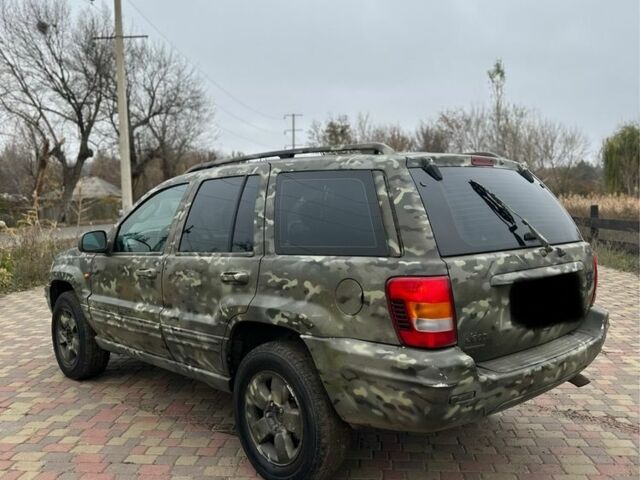 Зеленый Джип Гранд Чероки, объемом двигателя 2.7 л и пробегом 222 тыс. км за 3800 $, фото 5 на Automoto.ua