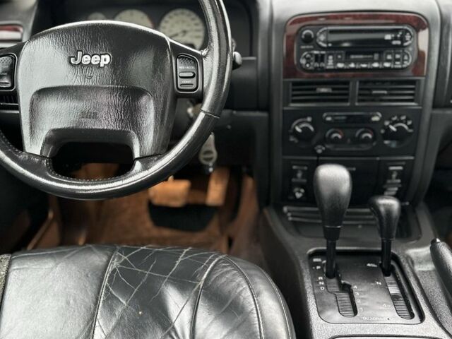 Зеленый Джип Гранд Чероки, объемом двигателя 2.7 л и пробегом 222 тыс. км за 3800 $, фото 8 на Automoto.ua