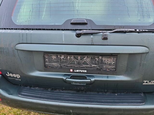 Зелений Джип Grand Cherokee, об'ємом двигуна 3.1 л та пробігом 260 тис. км за 4059 $, фото 5 на Automoto.ua