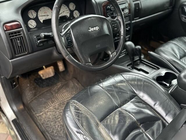 Зеленый Джип Гранд Чероки, объемом двигателя 2.7 л и пробегом 222 тыс. км за 3800 $, фото 9 на Automoto.ua