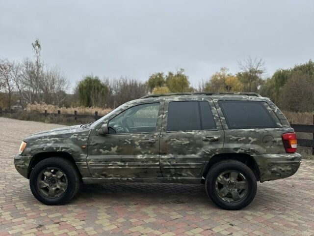 Зеленый Джип Гранд Чероки, объемом двигателя 2.7 л и пробегом 222 тыс. км за 3800 $, фото 6 на Automoto.ua