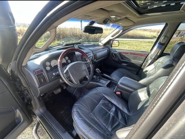 Зеленый Джип Гранд Чероки, объемом двигателя 2.7 л и пробегом 200 тыс. км за 3544 $, фото 2 на Automoto.ua