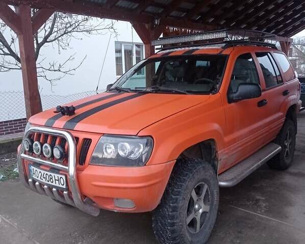Помаранчевий Джип Grand Cherokee, об'ємом двигуна 4.7 л та пробігом 259 тис. км за 7000 $, фото 1 на Automoto.ua