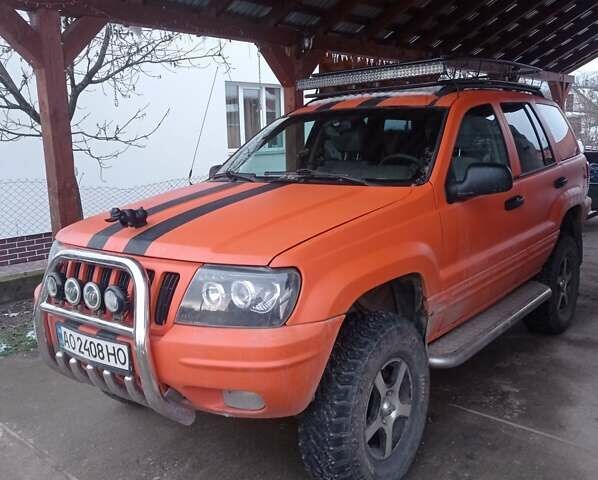 Помаранчевий Джип Grand Cherokee, об'ємом двигуна 4.7 л та пробігом 259 тис. км за 8000 $, фото 1 на Automoto.ua