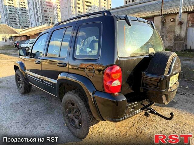 Черный Джип Либерти, объемом двигателя 2.5 л и пробегом 234 тыс. км за 2800 $, фото 2 на Automoto.ua