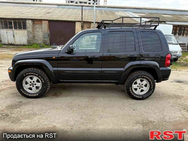 Черный Джип Либерти, объемом двигателя 2.5 л и пробегом 244 тыс. км за 3500 $, фото 1 на Automoto.ua