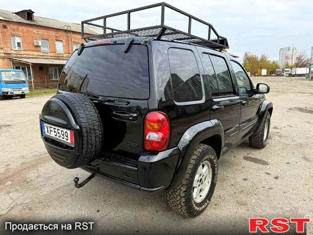 Черный Джип Либерти, объемом двигателя 2.5 л и пробегом 244 тыс. км за 3500 $, фото 5 на Automoto.ua