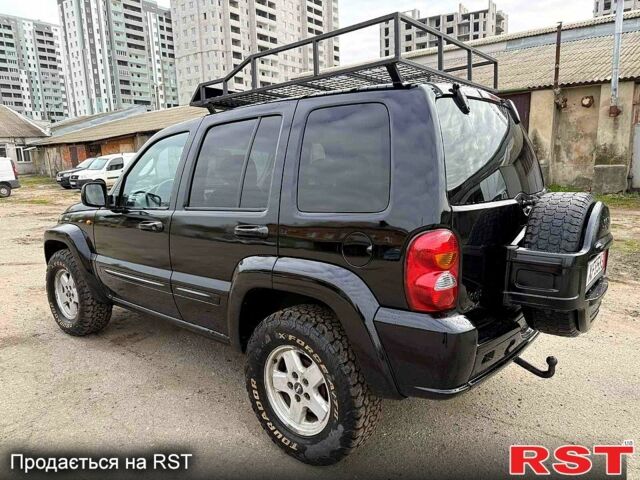 Черный Джип Либерти, объемом двигателя 2.5 л и пробегом 244 тыс. км за 3500 $, фото 2 на Automoto.ua