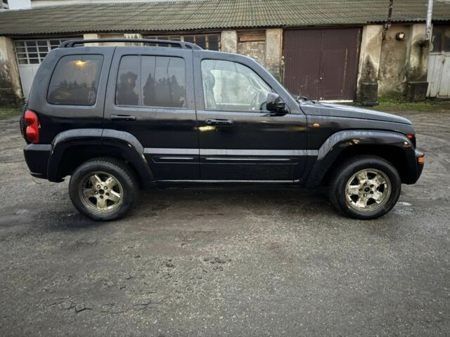 Чорний Джип Liberty, об'ємом двигуна 2.5 л та пробігом 307 тис. км за 3600 $, фото 4 на Automoto.ua