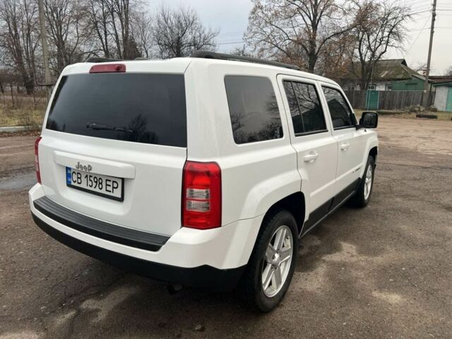 Білий Джип Patriot, об'ємом двигуна 2 л та пробігом 210 тис. км за 8500 $, фото 19 на Automoto.ua