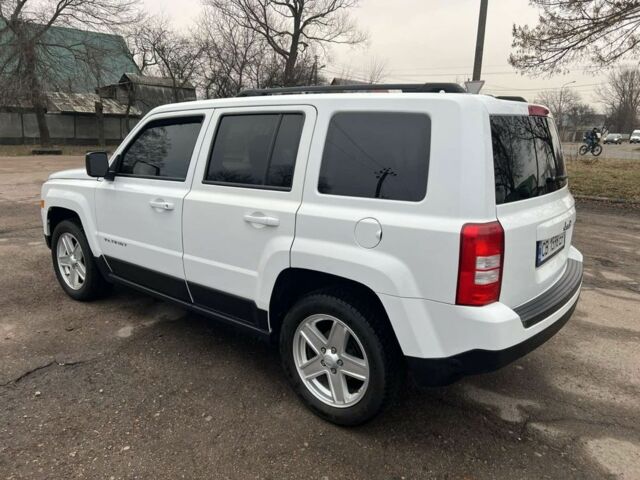 Білий Джип Patriot, об'ємом двигуна 2 л та пробігом 210 тис. км за 8500 $, фото 1 на Automoto.ua