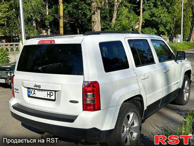 Білий Джип Patriot, об'ємом двигуна 2.4 л та пробігом 167 тис. км за 12300 $, фото 2 на Automoto.ua