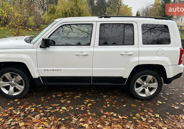 Білий Джип Patriot, об'ємом двигуна 2.36 л та пробігом 176 тис. км за 10500 $, фото 2 на Automoto.ua