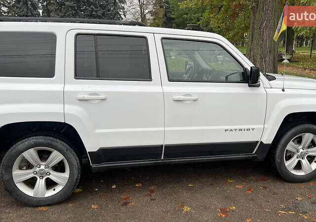 Білий Джип Patriot, об'ємом двигуна 2.36 л та пробігом 176 тис. км за 10500 $, фото 6 на Automoto.ua