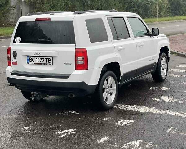 Белый Джип Патриот, объемом двигателя 2.36 л и пробегом 215 тыс. км за 7747 $, фото 3 на Automoto.ua