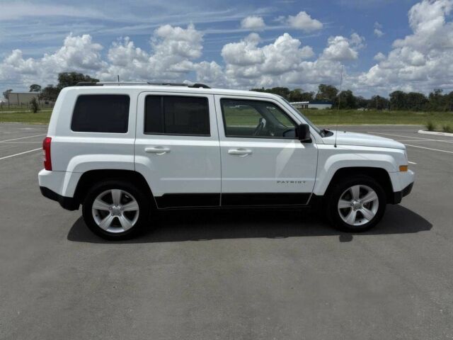 Белый Джип Патриот, объемом двигателя 2.4 л и пробегом 86 тыс. км за 6000 $, фото 2 на Automoto.ua