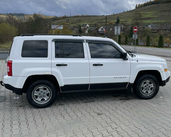 Белый Джип Патриот, объемом двигателя 2.36 л и пробегом 275 тыс. км за 7300 $, фото 4 на Automoto.ua