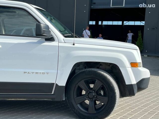 Джип Патриот 2014 в Львове на Automoto.ua Белый Джип Патриот, объемом двигателя 2 л и пробегом 108 тыс. км за 10490 $, фото 9 на Automoto.ua