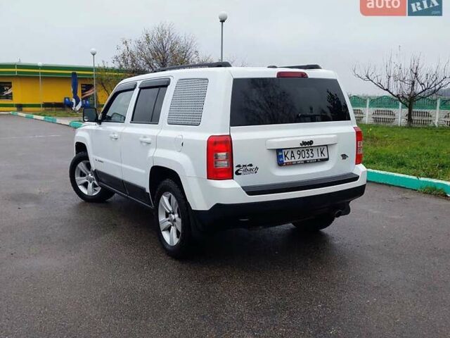 Білий Джип Patriot, об'ємом двигуна 2.4 л та пробігом 113 тис. км за 11300 $, фото 5 на Automoto.ua