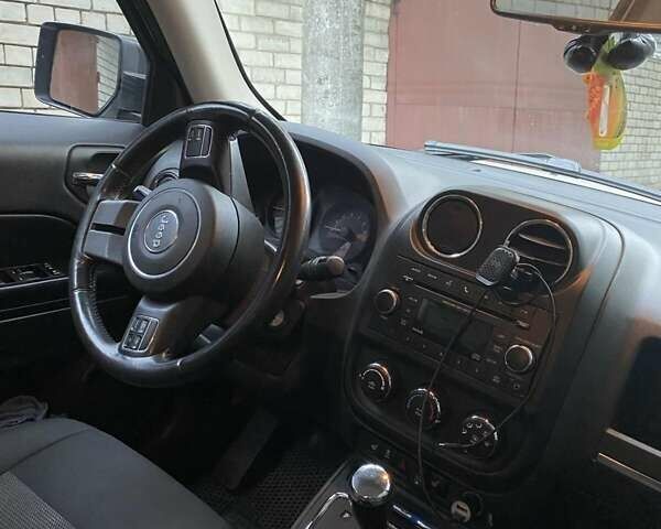 Джип Патриот 2014 в Чернигове на Automoto.ua Белый Джип Патриот, объемом двигателя 2.36 л и пробегом 95 тыс. км за 9800 $, фото 11 на Automoto.ua