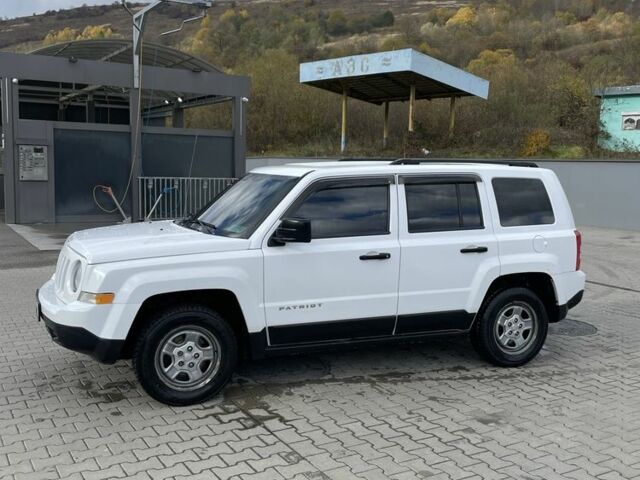 Белый Джип Патриот, объемом двигателя 2.4 л и пробегом 275 тыс. км за 8250 $, фото 7 на Automoto.ua