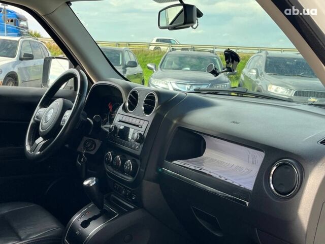 Джип Патриот 2014 в Львове на Automoto.ua Белый Джип Патриот, объемом двигателя 2 л и пробегом 108 тыс. км за 10490 $, фото 20 на Automoto.ua