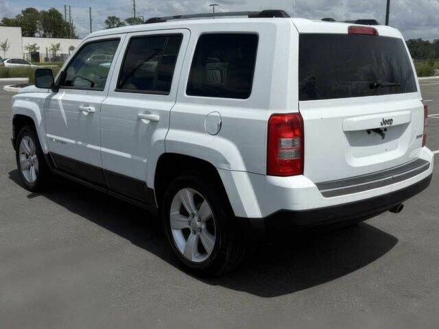 Белый Джип Патриот, объемом двигателя 2.4 л и пробегом 86 тыс. км за 6000 $, фото 4 на Automoto.ua