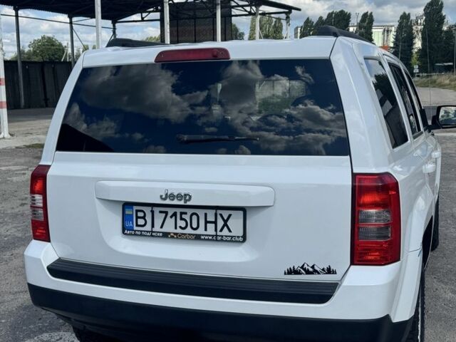 Белый Джип Патриот, объемом двигателя 2 л и пробегом 167 тыс. км за 7600 $, фото 5 на Automoto.ua