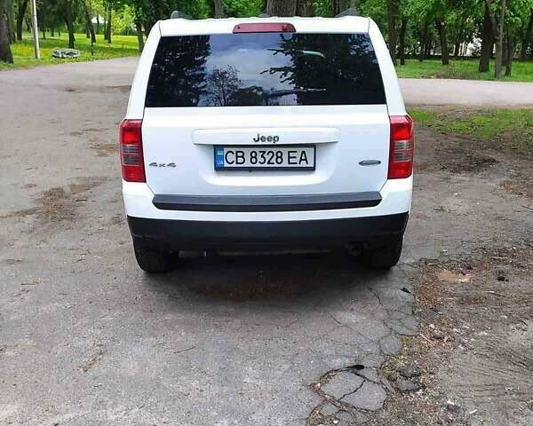 Джип Патриот 2014 в Чернигове на Automoto.ua Белый Джип Патриот, объемом двигателя 2.36 л и пробегом 95 тыс. км за 9800 $, фото 4 на Automoto.ua
